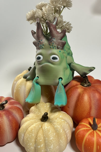 artisan-painted-moss-golem-planter, unique, cottagecore, collectables, Autumn Moss Golem, Articulated Golem planter, Layers in Green, Woodland guardian desk toy, Articulated forest monster, 3D printed desk companion, Moss monster pen holder, Cottagecore room decor, Dark academia desk accessories, Goblincore aesthetic decor, Mystical forest sculpture, Whimsical woodland gifts, Cozy cabin shelf styling, Fall harvest tabletop display, Grumpy pumpkin patch companion, Cute Halloween monster decor, Autumn