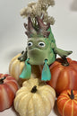 artisan-painted-moss-golem-planter, unique, cottagecore, collectables, Autumn Moss Golem, Articulated Golem planter, Layers in Green, Woodland guardian desk toy, Articulated forest monster, 3D printed desk companion, Moss monster pen holder, Cottagecore room decor, Dark academia desk accessories, Goblincore aesthetic decor, Mystical forest sculpture, Whimsical woodland gifts, Cozy cabin shelf styling, Fall harvest tabletop display, Grumpy pumpkin patch companion, Cute Halloween monster decor, Autumn